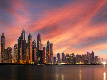 Dubai skyscrapers at night by Aleksandar Pasaric